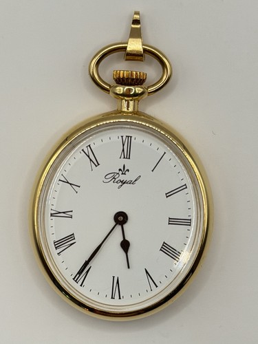 Eine goldfarbene taschenuhr - goldfarbene,